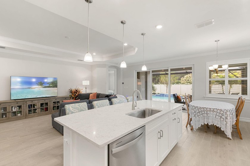 Experience refined South Naples living in this beautifully - photo 11
