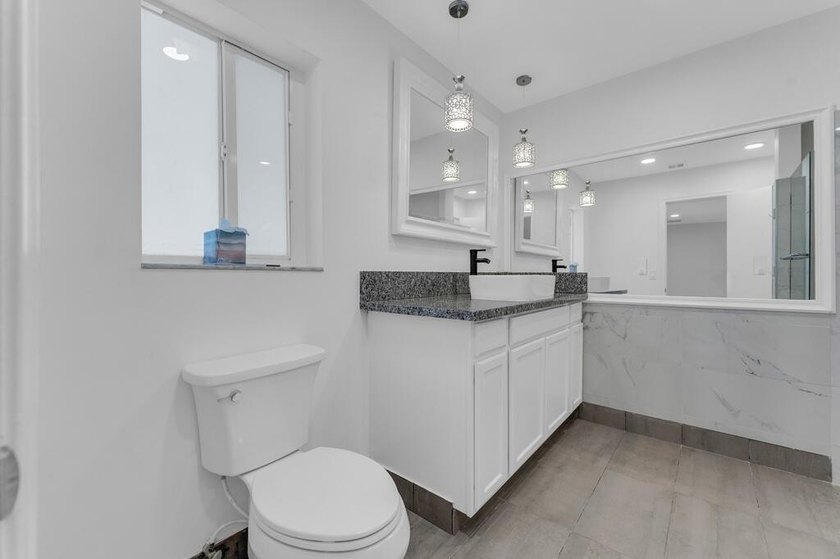 This stunning 4-bedroom, 2-bath pool home in the heart of Coral - photo 24