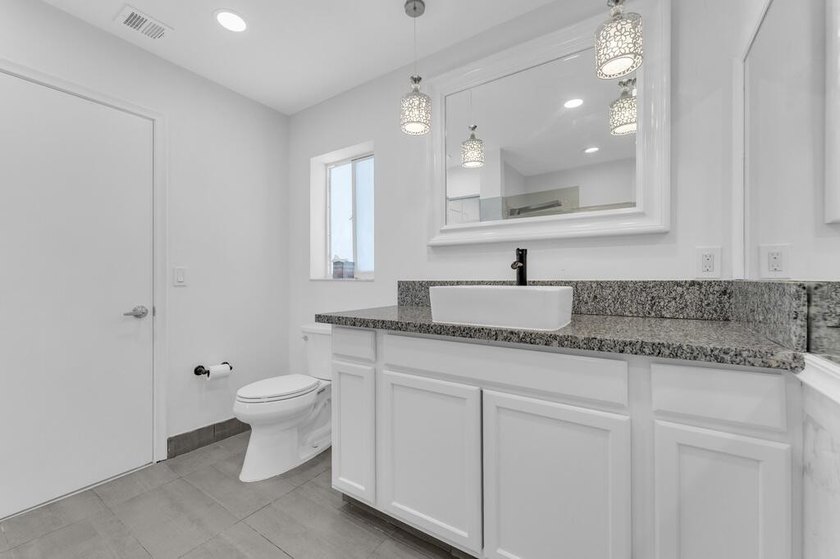 This stunning 4-bedroom, 2-bath pool home in the heart of Coral - photo 26