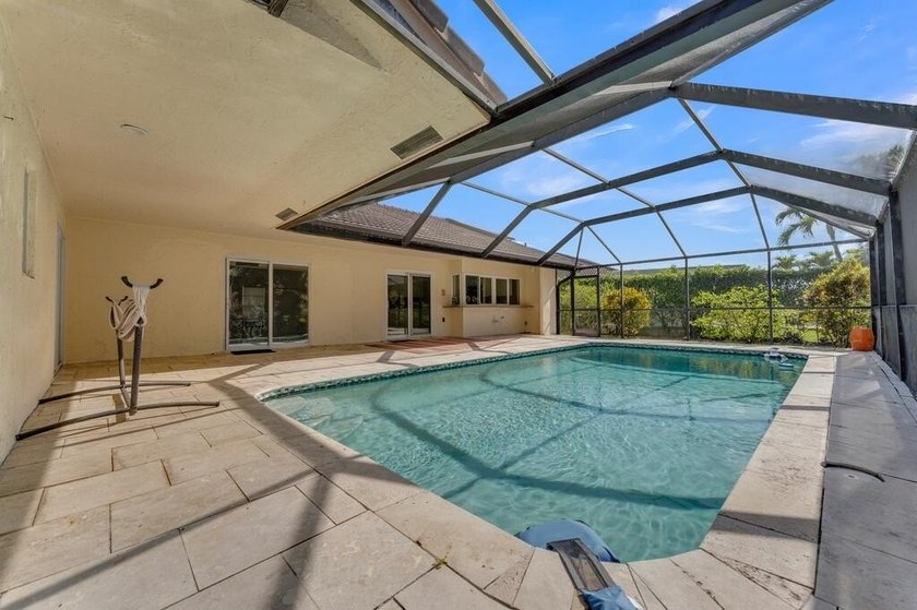 This stunning 4-bedroom, 2-bath pool home in the heart of Coral - photo 40