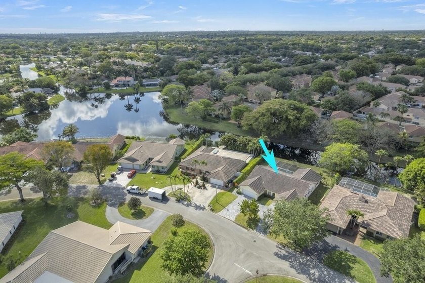 This stunning 4-bedroom, 2-bath pool home in the heart of Coral - photo 43