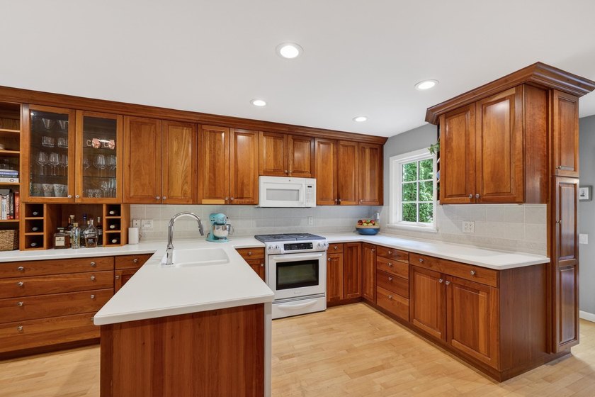 OPEN HOUSE CANCELED! Tucked into a beautiful village setting - photo 17