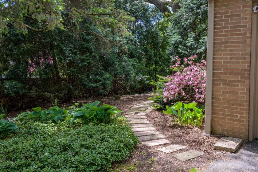 OPEN HOUSE CANCELED! Tucked into a beautiful village setting - photo 45