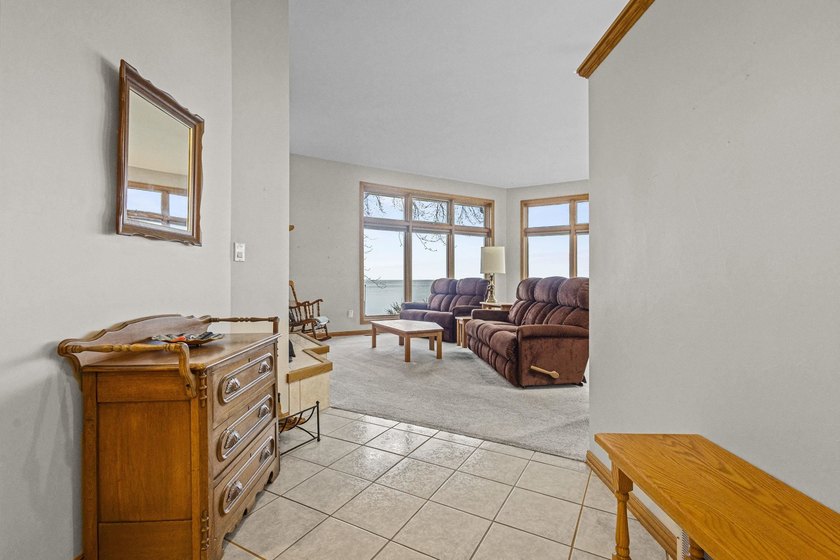 Premier bayfront property on Sunset Shores! Enjoy breathtaking - photo 10