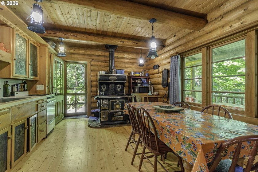 Experience a unique log cabin getaway at Fishhawk Lake, built - photo 8