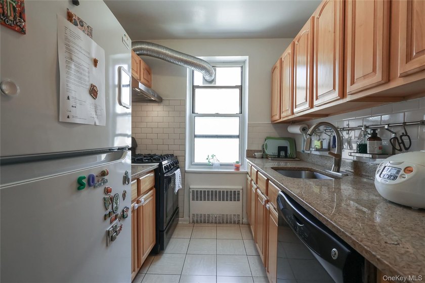 Step into this extra spacious one-bedroom corner unit offering - photo 15