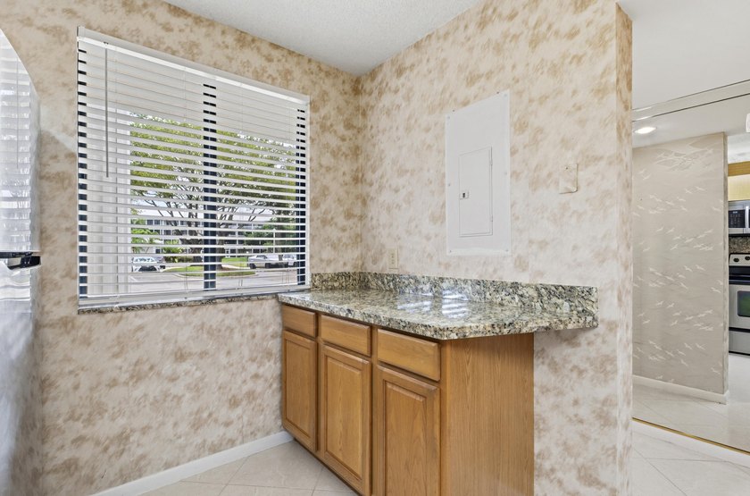 This inviting first-floor, two-bedroom, two-bath condo offers a - photo 6