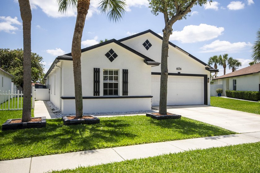 Beautifully updated 4-bedroom, 2-bath home featuring a brand-new - photo 3