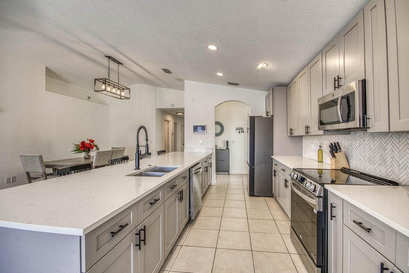 Beautifully updated 4-bedroom, 2-bath home featuring a brand-new - photo 8