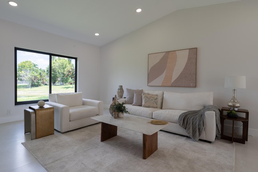 Welcome home to this extensively renovated lakefront home in the - photo 12