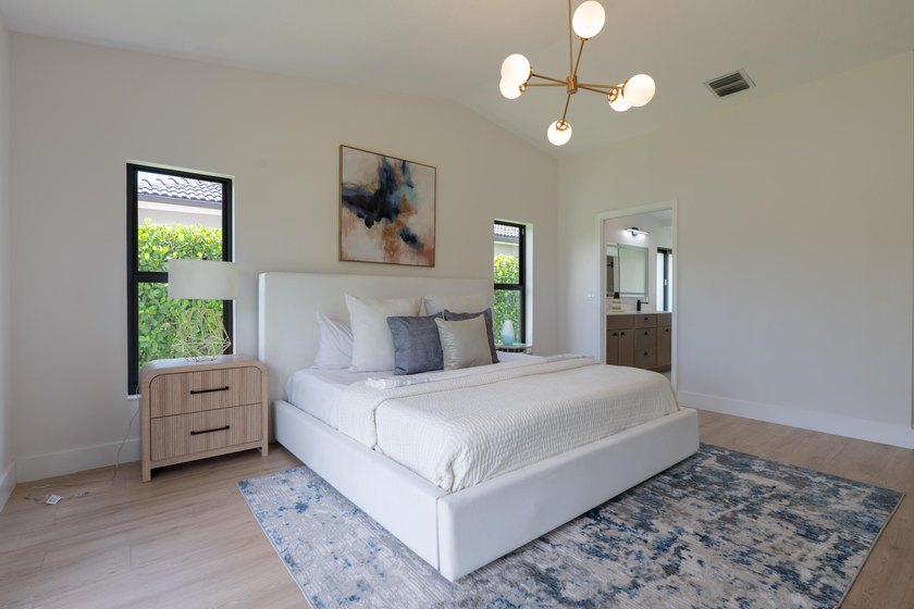 Welcome home to this extensively renovated lakefront home in the - photo 19