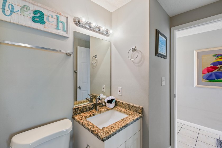 Gulf views take center stage in this beautifully updated - photo 23