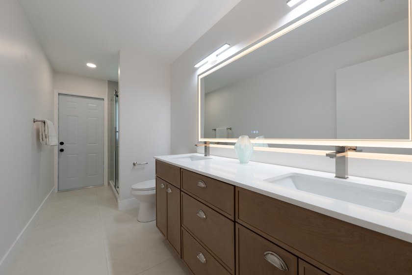 Welcome home to this extensively renovated lakefront home in the - photo 29