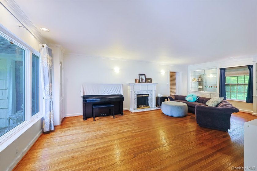 Located in the highly desirable Village of Lake Success, this - photo 4