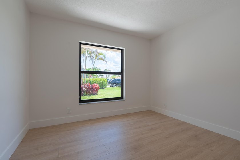 Welcome home to this extensively renovated lakefront home in the - photo 34