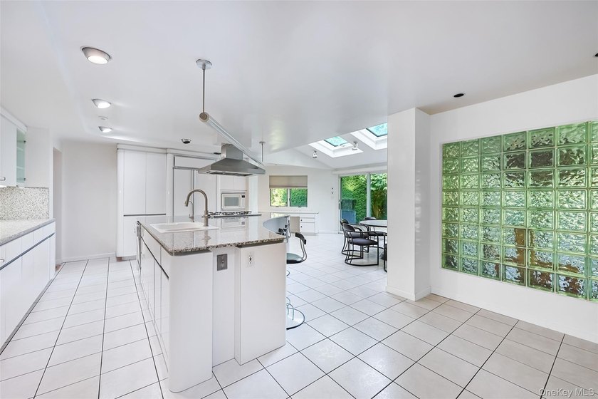 Located in the highly desirable Village of Lake Success, this - photo 9