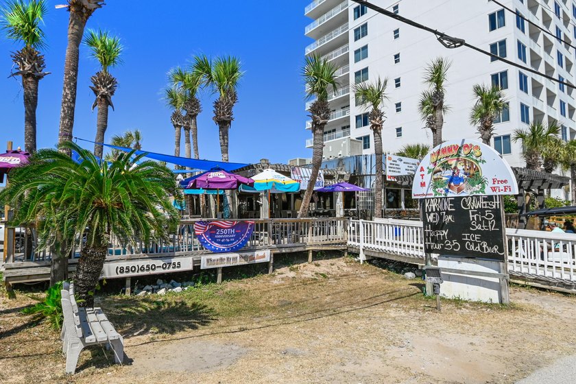 Gulf views take center stage in this beautifully updated - photo 40