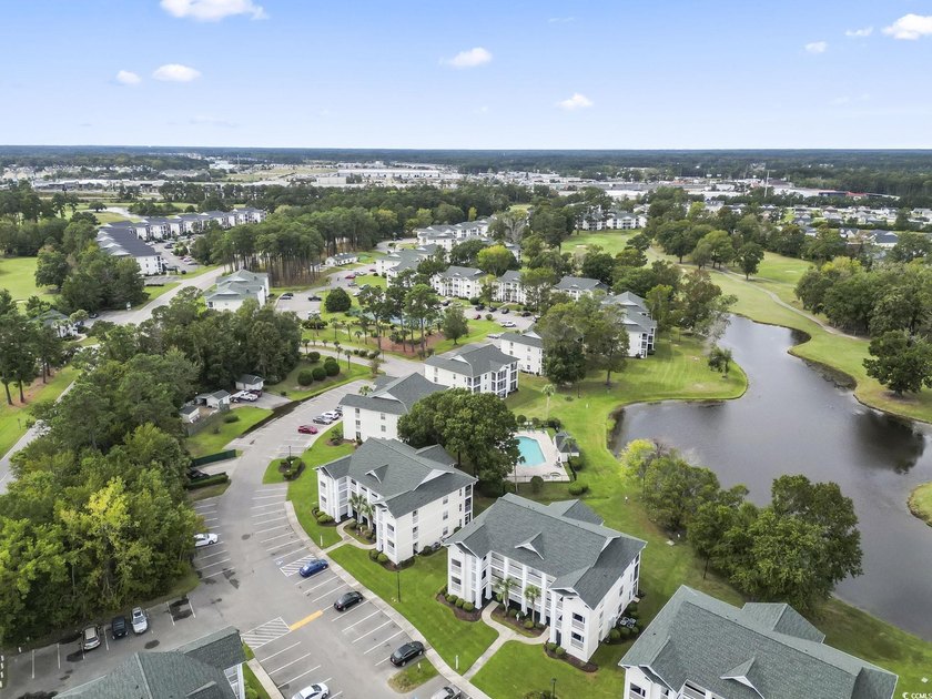 This captivating 3rd floor end unit features 2 bedrooms and 2 - photo 3