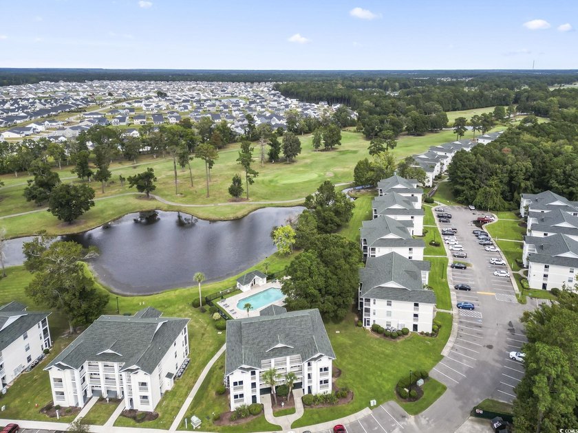 This captivating 3rd floor end unit features 2 bedrooms and 2 - photo 4