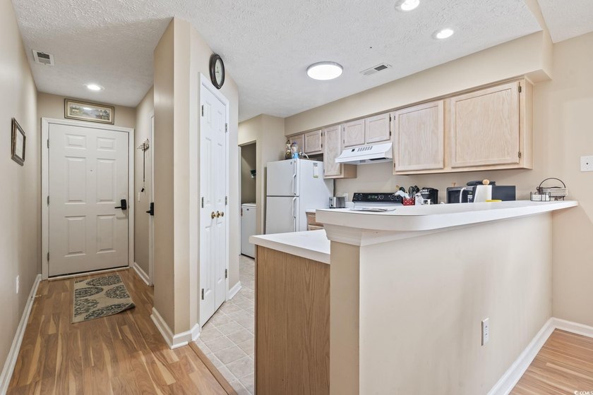 This captivating 3rd floor end unit features 2 bedrooms and 2 - photo 6