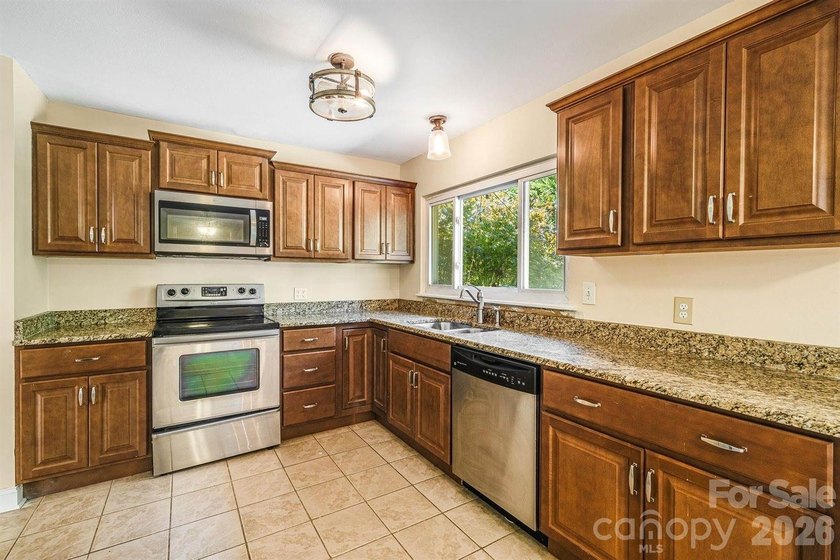 Imagine returning home in sought-after North Asheville. A - photo 12