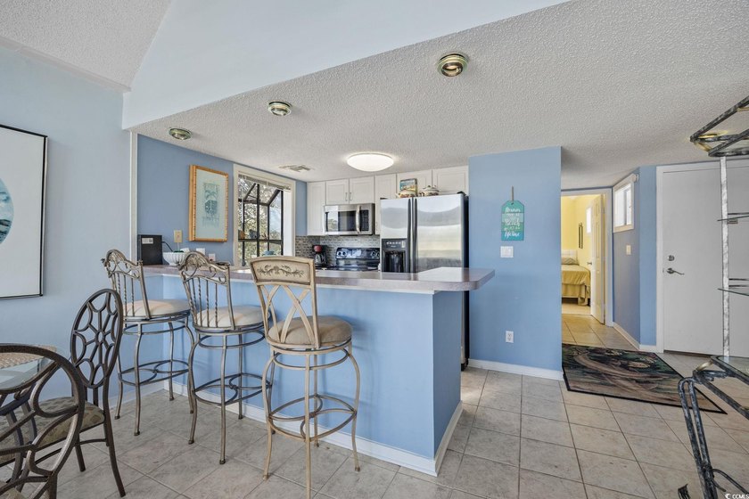 Motivated Seller! Beautiful top-floor, corner 2BR/2BA fully - photo 5