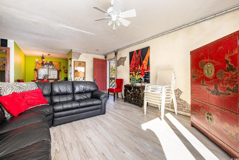 Welcome to this charming two-bedroom, two-bathroom end-unit - photo 9