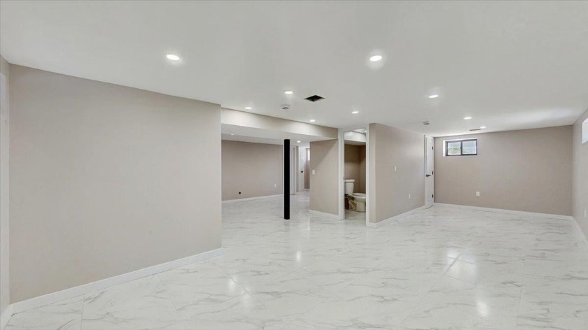 Welcome to this one-of-a-kind, fully gut-renovated 3-level - photo 29