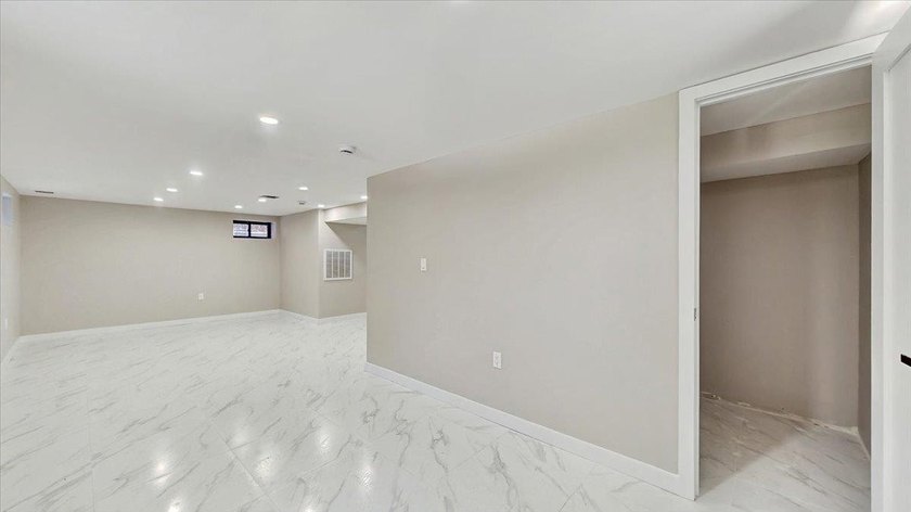 Welcome to this one-of-a-kind, fully gut-renovated 3-level - photo 30