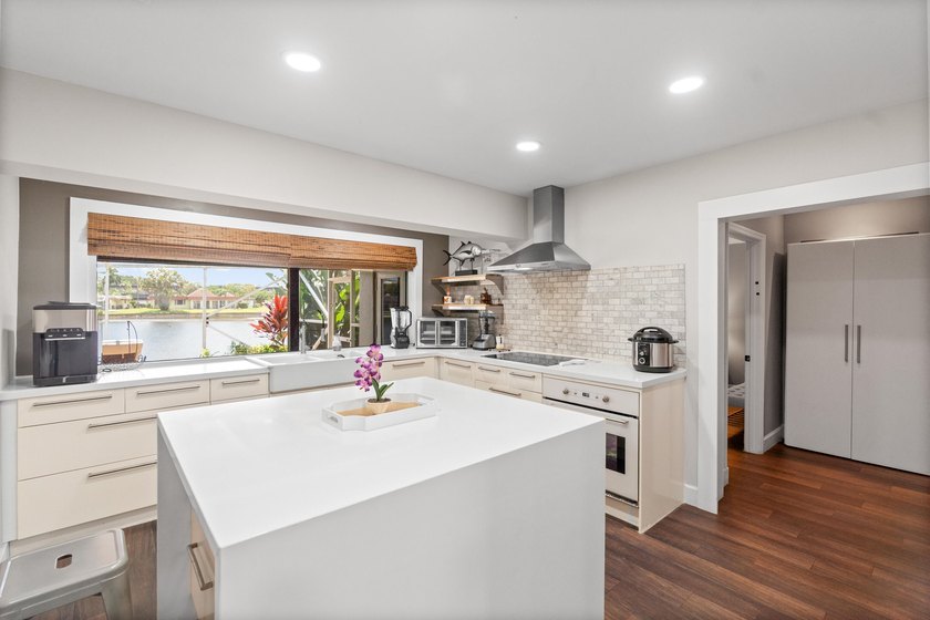 Completely remodeled and designed for luxury living, this - photo 11