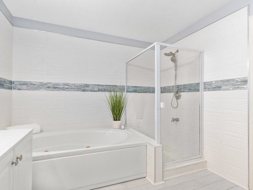 Thoughtfully refreshed and move-in ready. Since its previous - photo 12