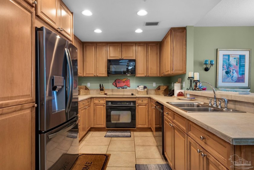 Great condo with spectacular views showcasing tranquil water and - photo 12