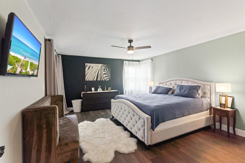 Completely remodeled and designed for luxury living, this - photo 29