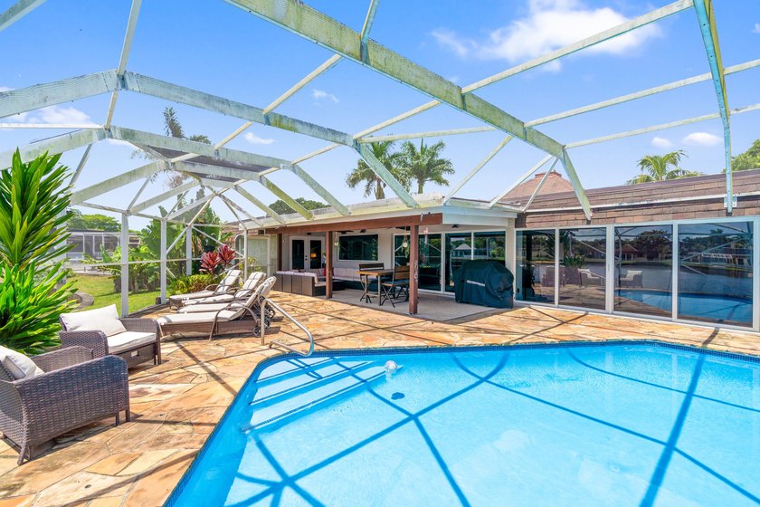 Completely remodeled and designed for luxury living, this - photo 36