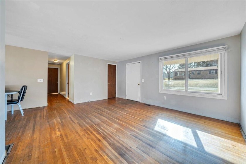 This one-level brick ranch offers plenty of potential and is - photo 9