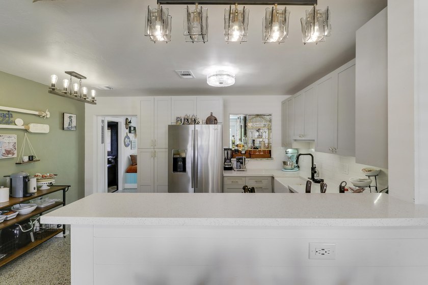 Completely remodeled 3-bedroom, 2-bath home in North Palm Beach! - photo 12
