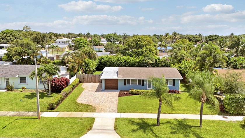 Completely remodeled 3-bedroom, 2-bath home in North Palm Beach! - photo 40