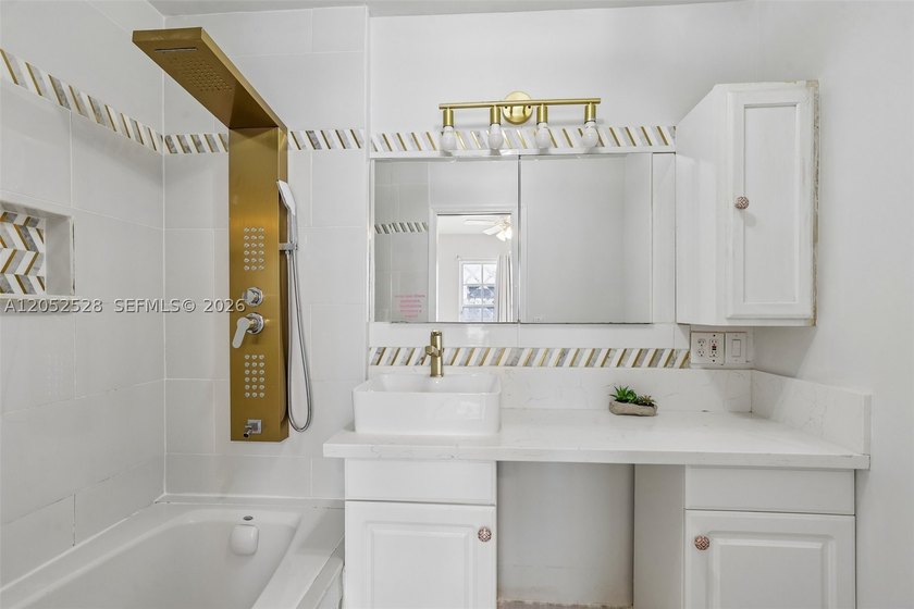 Enjoy peaceful lakefront views in this spacious 4 bedroom, 3 - photo 22
