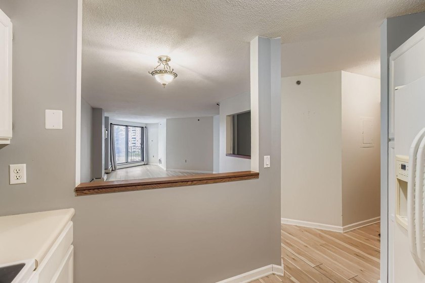 Welcome to Unit 401 at 6500 Woodlake Drive, an inviting - photo 12