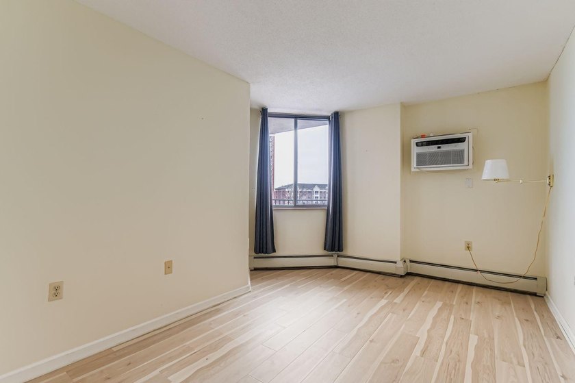 Welcome to Unit 401 at 6500 Woodlake Drive, an inviting - photo 18