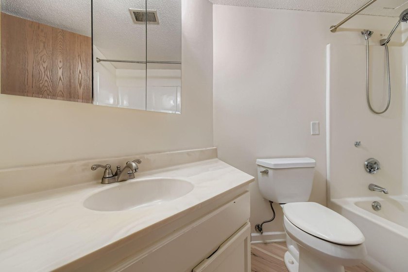 Welcome to Unit 401 at 6500 Woodlake Drive, an inviting - photo 19