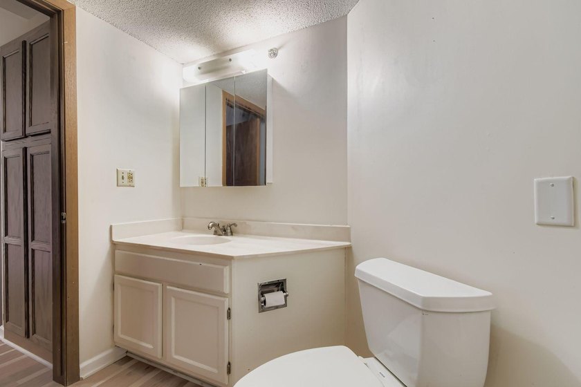 Welcome to Unit 401 at 6500 Woodlake Drive, an inviting - photo 20