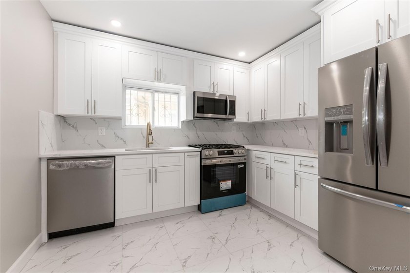 Welcome to this beautifully renovated single-family home located - photo 9
