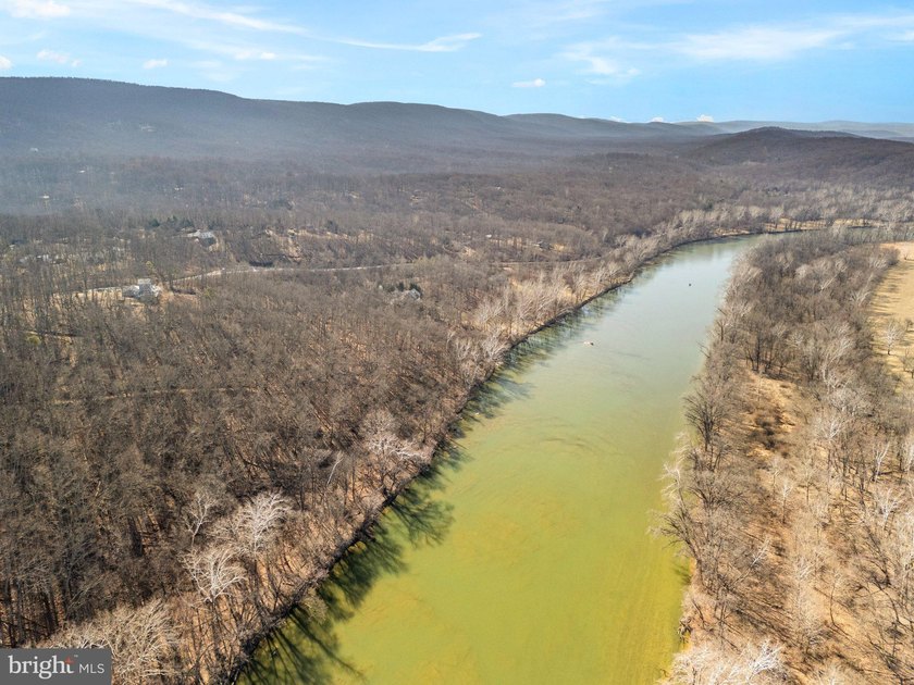 Discover the potential of this 4.9+/- acre waterfront parcel on - photo 5