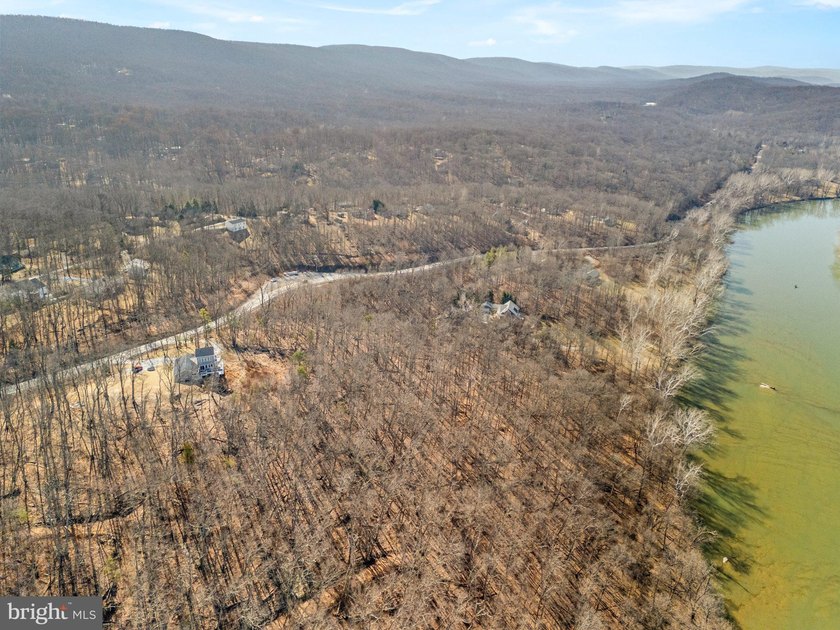 Discover the potential of this 4.9+/- acre waterfront parcel on - photo 6