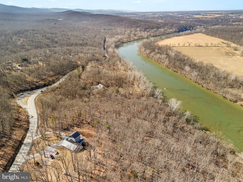 Discover the potential of this 4.9+/- acre waterfront parcel on - photo 7