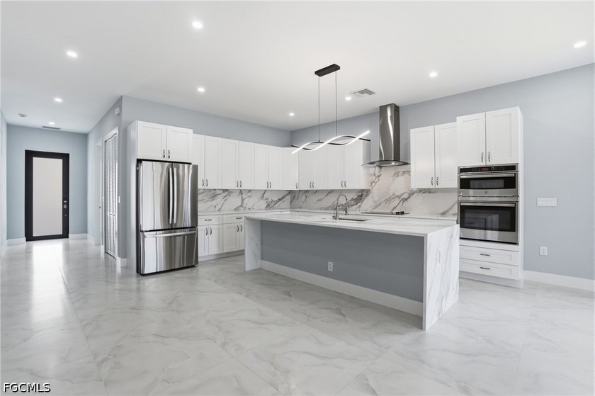A Modern Coastal Masterpiece in Bonita Springs This - photo 8