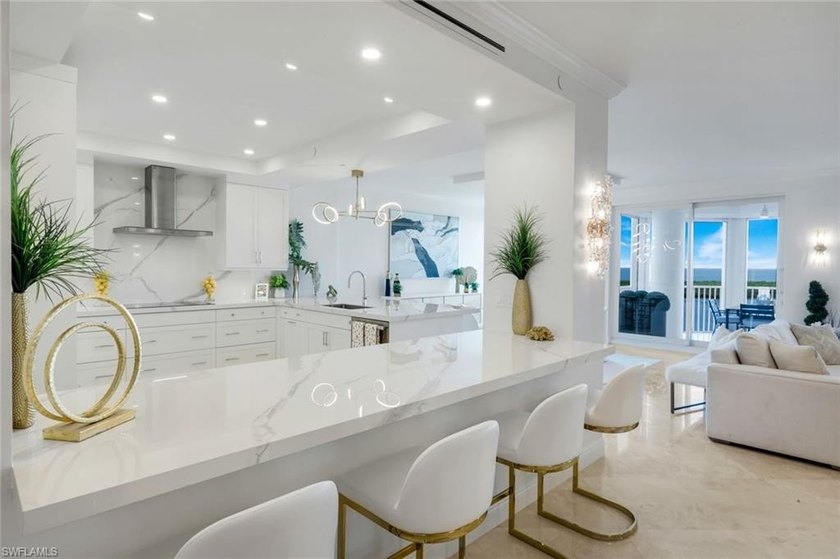 Sweeping Gulf and Bay views set the stage for this beautifully - photo 2