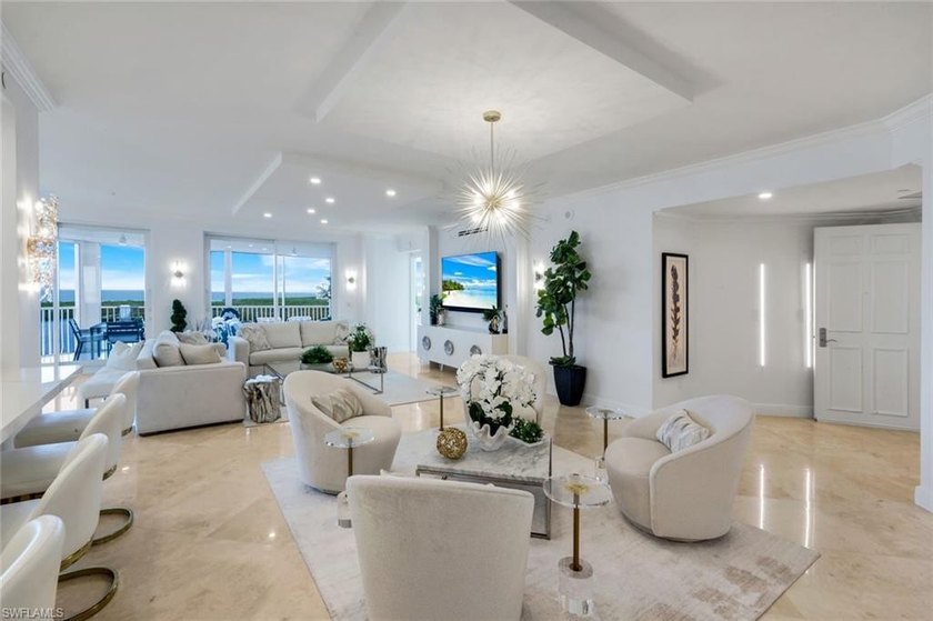 Sweeping Gulf and Bay views set the stage for this beautifully - photo 3