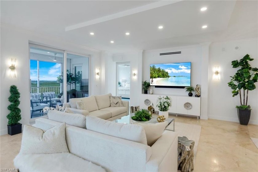 Sweeping Gulf and Bay views set the stage for this beautifully - photo 4